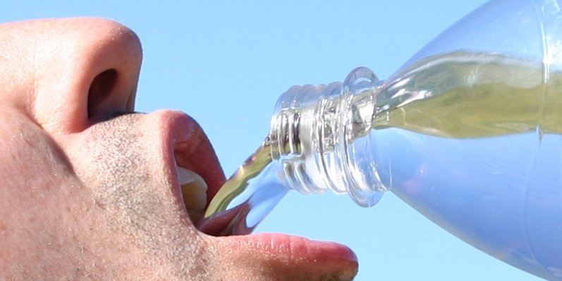 A Person Drinking Water